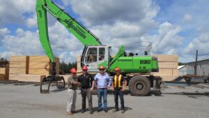 Elmsdale Lumber’s team effort to choose the right machine for log-loading duties include: (l-r) Robin Wilber, President; Terry Pickard, Territory Manager for Strongco; Mark Wilber, Vice President; Craig Stewart, Yard Supervisor.