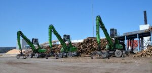Port Hawkesbury Paper recently added a third SENNEBOGEN log handler to its fleet after the first two accumulated a total of 100,000 service hours.