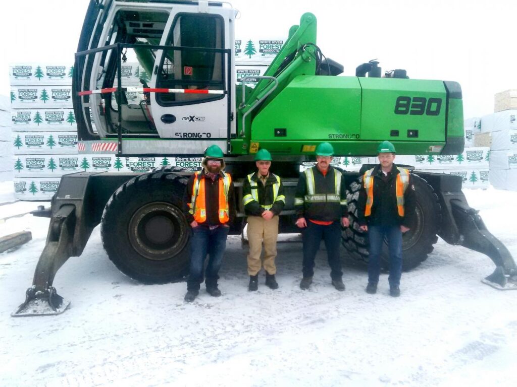 People pictured from left to right: Rob Acs, Yard Supervisor; Pierre Pellitier, Operator; Kevin Chaisson, Lead Hand; Pascal Champoux, Mill Manager.